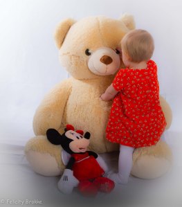 Image of toddler with bear